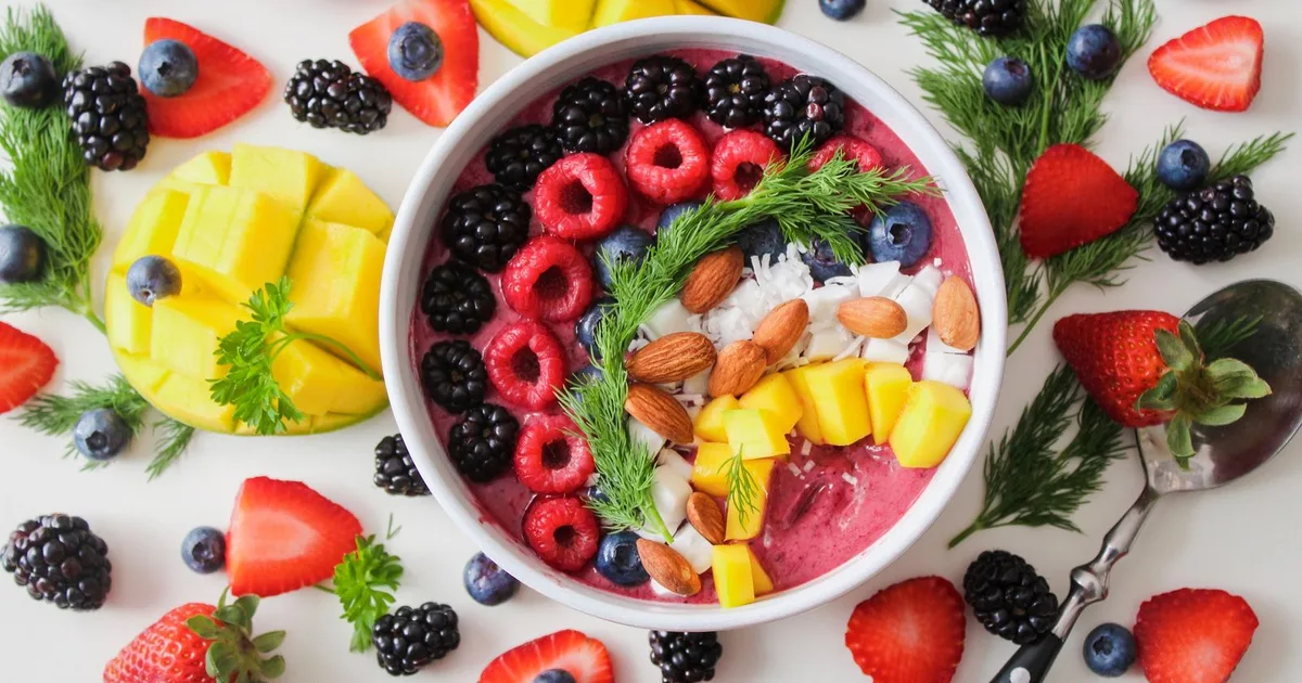 Crossed-out fad diet products beside a plate of whole, real foods