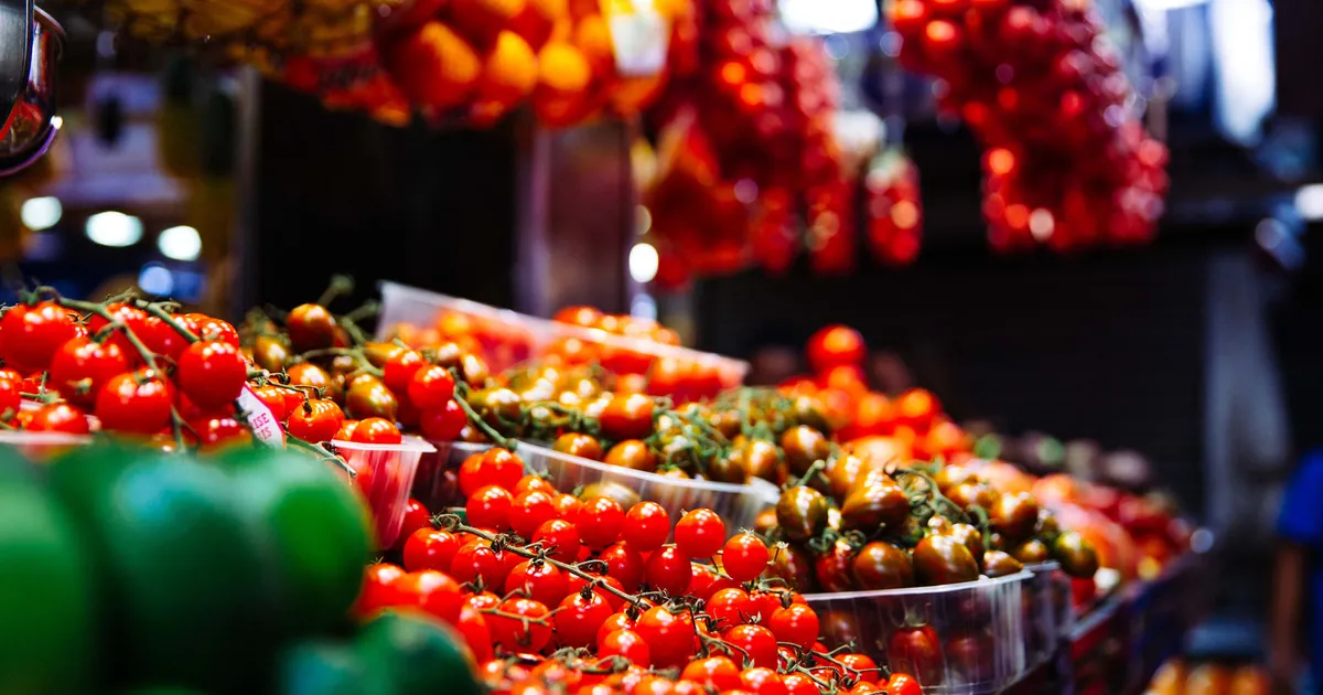 Fresh tomatoes on a market stall
