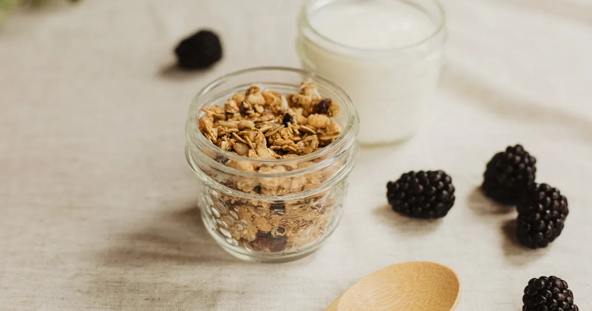 Yoghurt and granola breakfast pots with blackberries